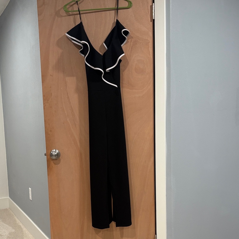 Bebe Black Jumpsuit with White Accents